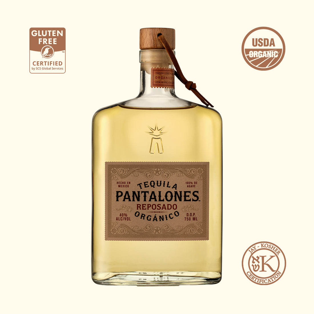 A bottle of Pantalones Tequila Reposado with a label that reads '100% Organico' and indicates it is gluten-free and USDA organic certified. The bottle has a wooden cap and the liquid inside appears to be a light amber color, indicative of its aged quality.